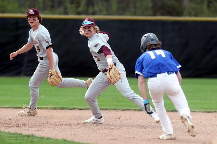 New Albany&#39;s Owen Johnson (4) backs up Oliver Shroyer (3) during a double play April 15 against Gahanna. Coach Dave Starling said the middle infield tandem has been a strength for the defending Division I state champion Eagles.