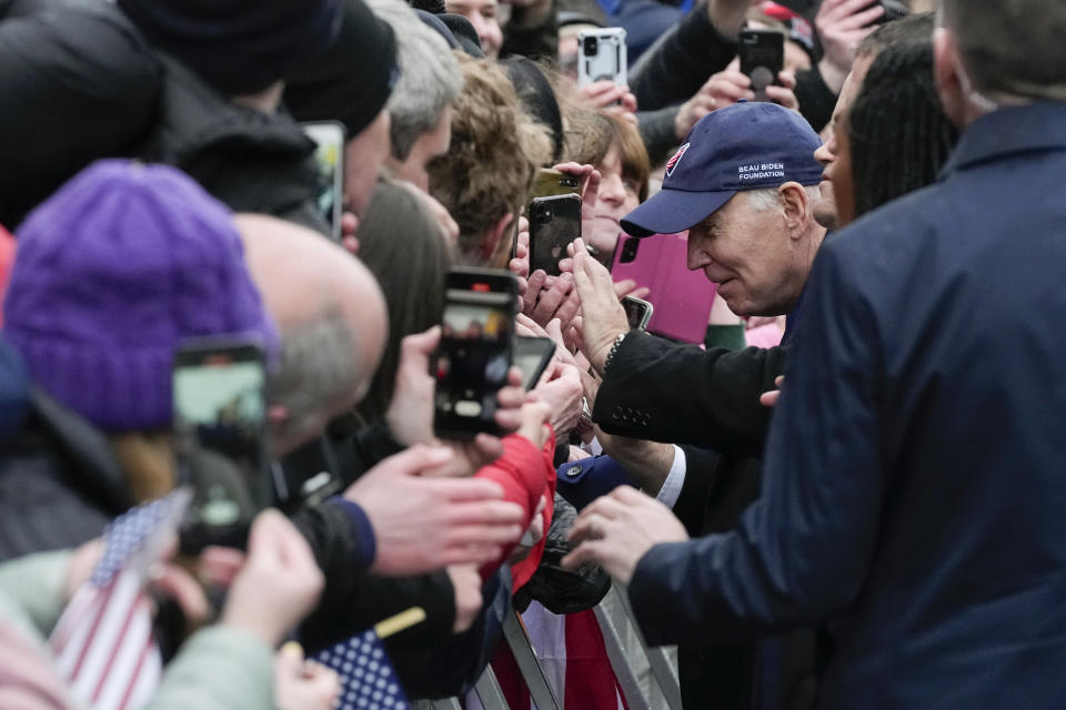 President Joe Biden waves to a person in the crowd as he does a walkabout in Dundalk, Ireland, Wednesday, April 12, 2023. Biden is on a three day visit to Ireland. (AP Photo/Patrick Semansky)