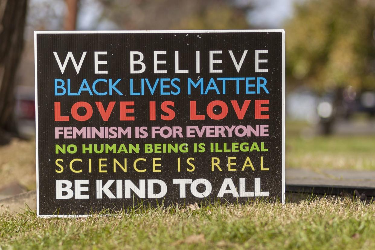 Rockville, MD, USA 11/22/2020: a manifesto on a yard sign with elements of progressive agenda such as humanism, anti racism, pro immigration, pro gay rights, equality, woman rights, and rationalism.