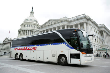 A U.S. Senate caravan leaves from Capitol Hill to attend a North Korea briefing at the White House. REUTERS/Yuri Gripas