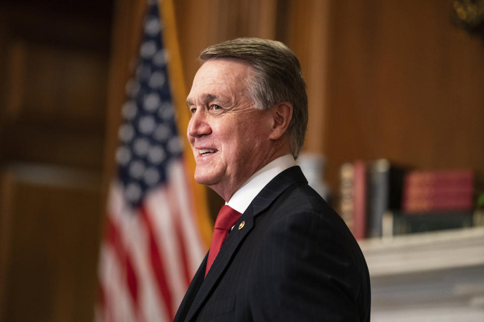 Sen. David Perdue, R-Ga., meets with Judge Amy Coney Barrett, President Donald Trumps nominee for the U.S. Supreme Court, not pictured, on Capitol Hill in Washington, Wednesday, Sept. 30, 2020. (Anna Moneymaker/The New York Times via AP, Pool)