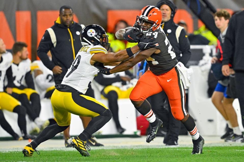 Browns running back Nick Chubb gets past Steelers safety Minkah Fitzpatrick during the first half in Cleveland, Thursday, Sept. 22, 2022.