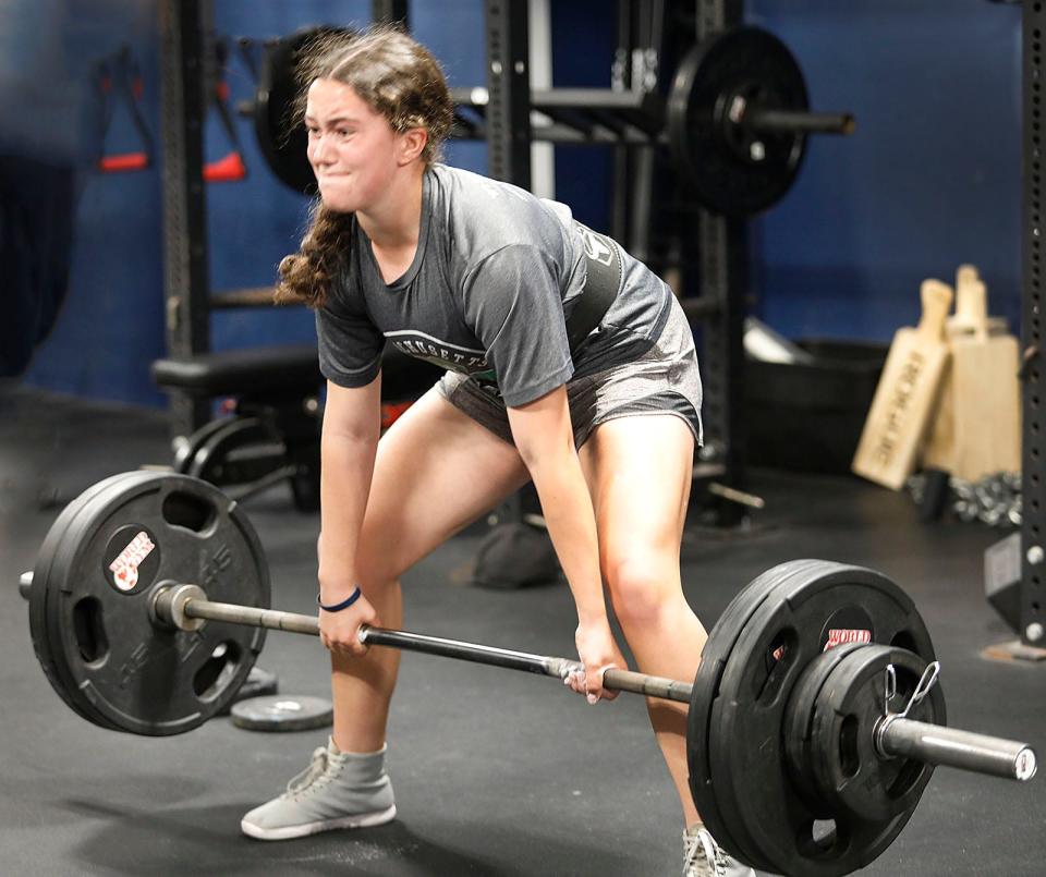 Braintree High sophomore lacrosse player Bella Duffy moonlights as a powerlifter. She has deadlifted 330 pounds. She works out at Atlantic Sports Performance in Hanover on Friday, April 28, 2023.