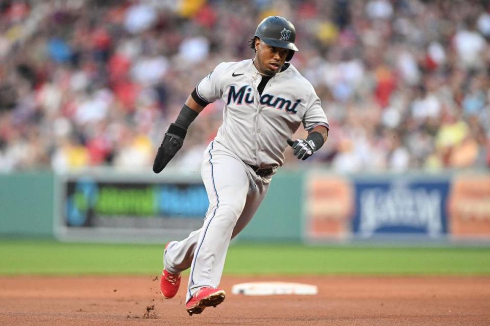 Miami Marlins third baseman Jean Segura (9) runs towards third base during the eighth inning of a game against the Boston Red Sox at Fenway Park.