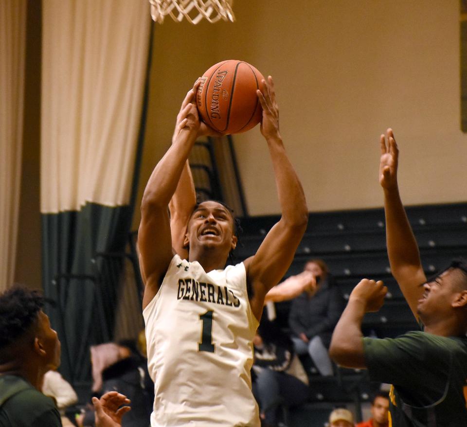 Herkimer College General Jayden Stephens (1) draws a foul from behind during the second half of Wednesday's game against SUNY-Adirondack.