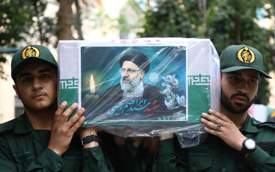 The body of Iranian president Ebrahim Raisi is brought to the revered Fatima Masumeh Shrine in Qom