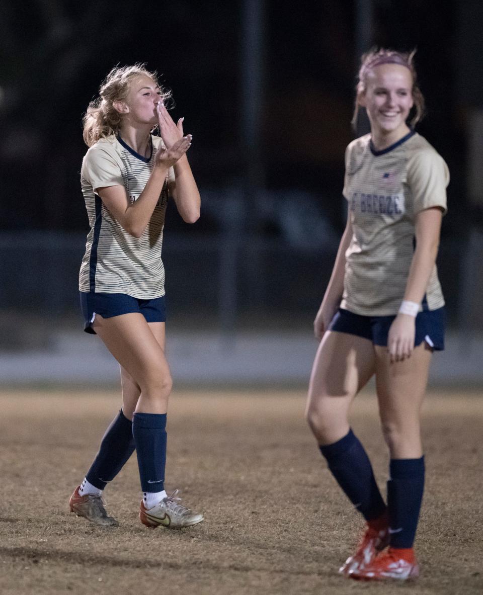 Ava Matherne (5) blows kisses to the sideline after scoring her second goal of the night giving the Dolphins a 2-0 lead during the Stanton vs Gulf Breeze girls 1-5A Regional Final championship game at Gulf Breeze High School on Tuesday, Feb. 15, 2022.