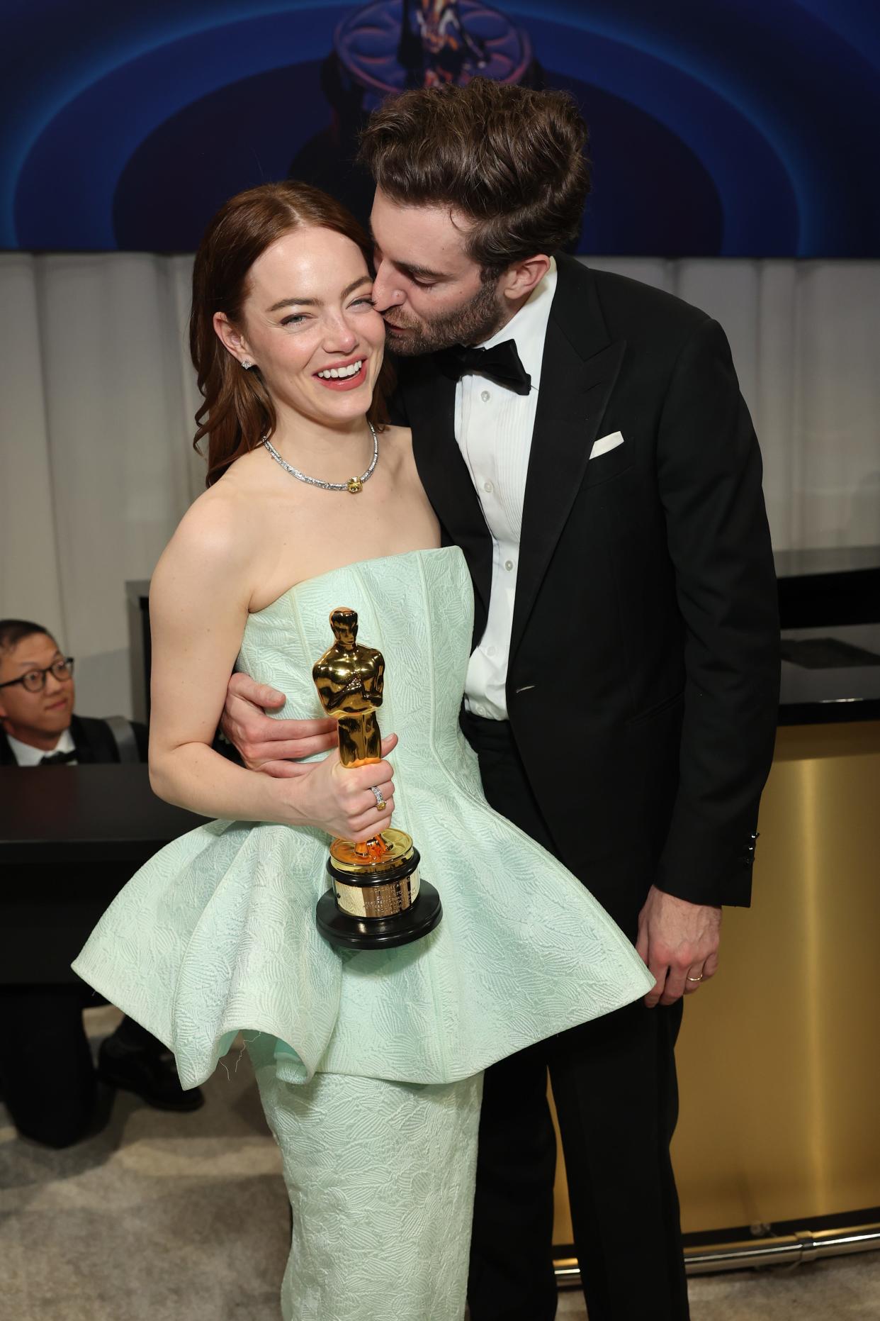 Best actress winner Emma Stone, left, and husband Dave McCary at the 2024 Governors Ball in Los Angeles.