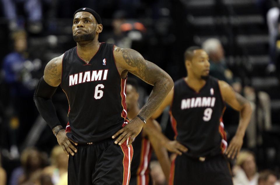 Miami Heat forward LeBron James (6) reacts after bing fouled while playing the Indiana Pacers during the second half of an NBA basketball game in Indianapolis, Wednesday, March 26, 2014. The Pacers won 84-83. (AP Photo/AJ Mast)