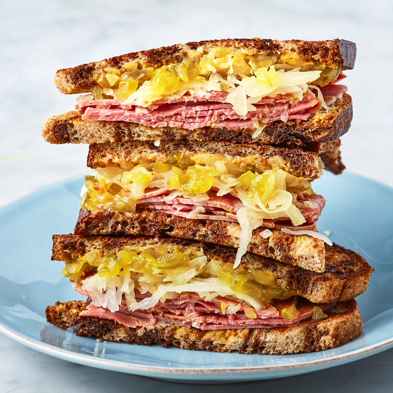 <p>Corned beef sandwiches are a favourite at local delis, and for good reason. With corned beef, sauerkraut, and relish, what's not to love? We spread ours with a thick layer of mustard for one perfect sandwich. </p><p>Get the <a href="https://www.delish.com/uk/cooking/recipes/a30991965/corned-beef-sandwich-recipe/" rel="nofollow noopener" target="_blank" data-ylk="slk:Corned Beef Sandwich;elm:context_link;itc:0;sec:content-canvas" class="link ">Corned Beef Sandwich</a> recipe.</p>