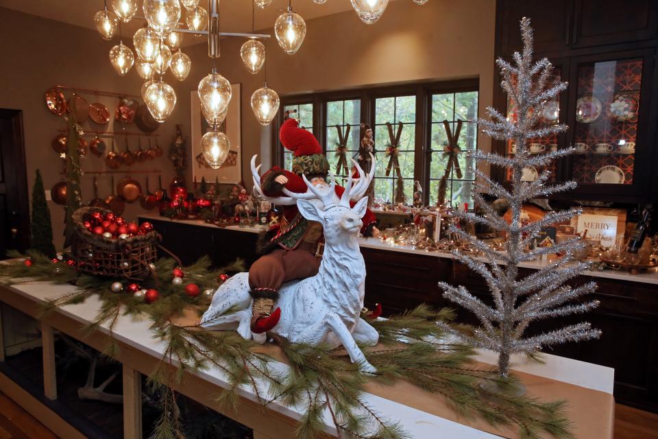 The kitchen island is the ideal spot for Santa and one of his reindeer at this year’s Christmas Fantasy House.