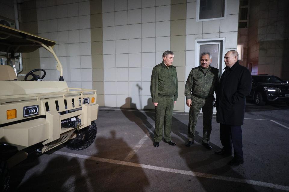 Russian President Vladimir Putin, right, listens to Russian Defense Minister Sergei Shoigu, center, and Russian Chief of General Staff Gen. Valery Gerasimov as they visit the headquarters of Russia's Southern Military District in Rostov-on-Don, Russia, on Thursday, Nov. 9, 2023. (Gavriil Grigorov, Sputnik, Kremlin Pool Photo via AP)