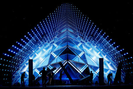 Workers set the stage before the beginning of a dress rehearsal for the first semi-final of the 2019 Eurovision Song Contest in Tel Aviv, Israel May 13, 2019. REUTERS/Ronen Zvulun