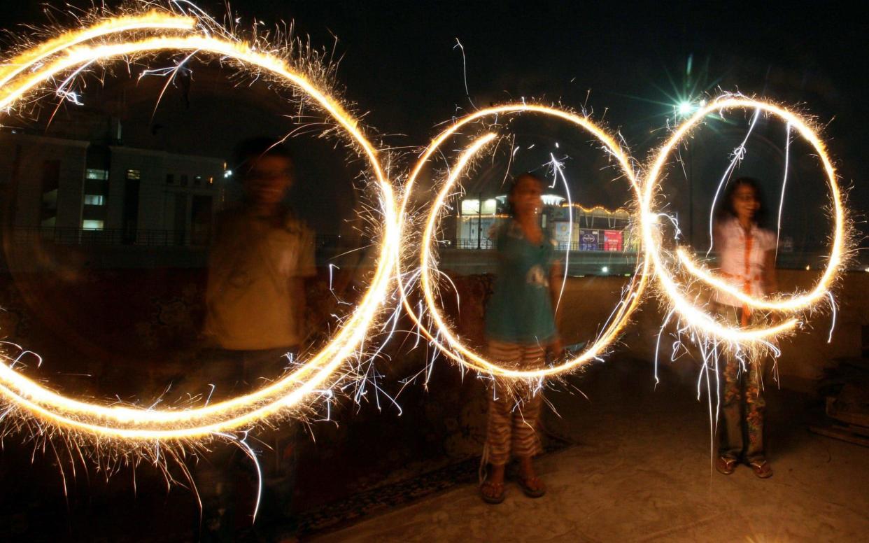 Children burn firecrackers on the eve of Diwali - The India Today Group