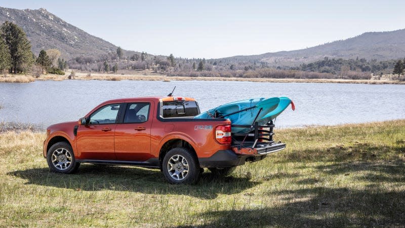 A photo of an orange Ford Maverick pickup truck. 