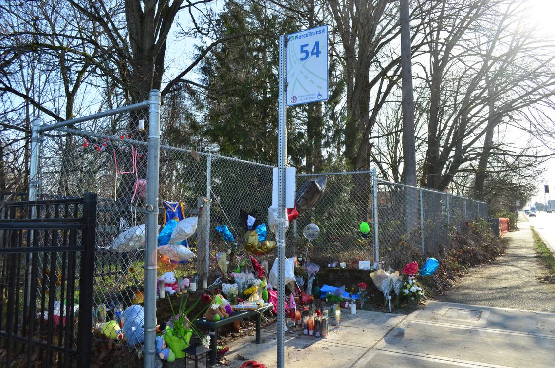 Stuffed animals, candles, balloons, a basketball jersey and other items adorn a memorial made for Xaviar Siess at the Portland Avenue bus stop where he was killed in a shooting on Jan. 12, 2023. The victim’s mother, Daine Mabel, said her son was headed to the mall with friends when he was shot.