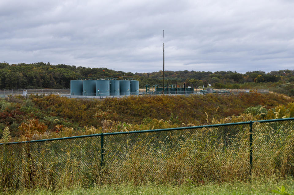 In this Oct. 17, 2019, photo, storage tanks are seen at a shale gas well pad in Zelienople, Pa. President Donald Trump has aligned with Pennsylvania's natural gas industry, but his support for the industry in the nation's No. 2 natural gas state may not yield the expected political boost in what is perhaps the nation's premier presidential battleground state. In parts of the state critical to his path to victory, opposition to fracking is growing and calls for getting tough on the industry are popular. (AP Photo/Keith Srakocic)