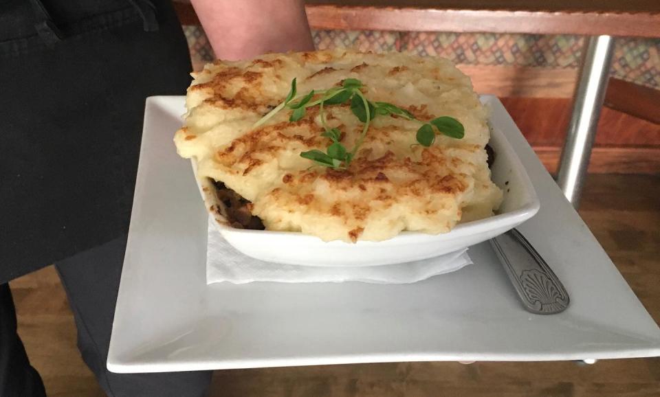 Cottage Pie from Busker's Irish Pub and Restaurant﻿ made with ground beef, carrots, onions, peas and mushrooms simmered in gravy topped with mashed potatoes.