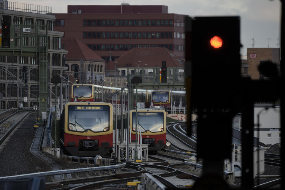 Trains of Berlin's S-Bahn public transport parked on tracks in Berlin, Germany, Monday, March 27, 2023, during a national wide public transport strike. An increased number of travelers in Germany boarded trains and planes on Sunday before the one-day strike that started Monday. (AP Photo/Markus Schreiber)