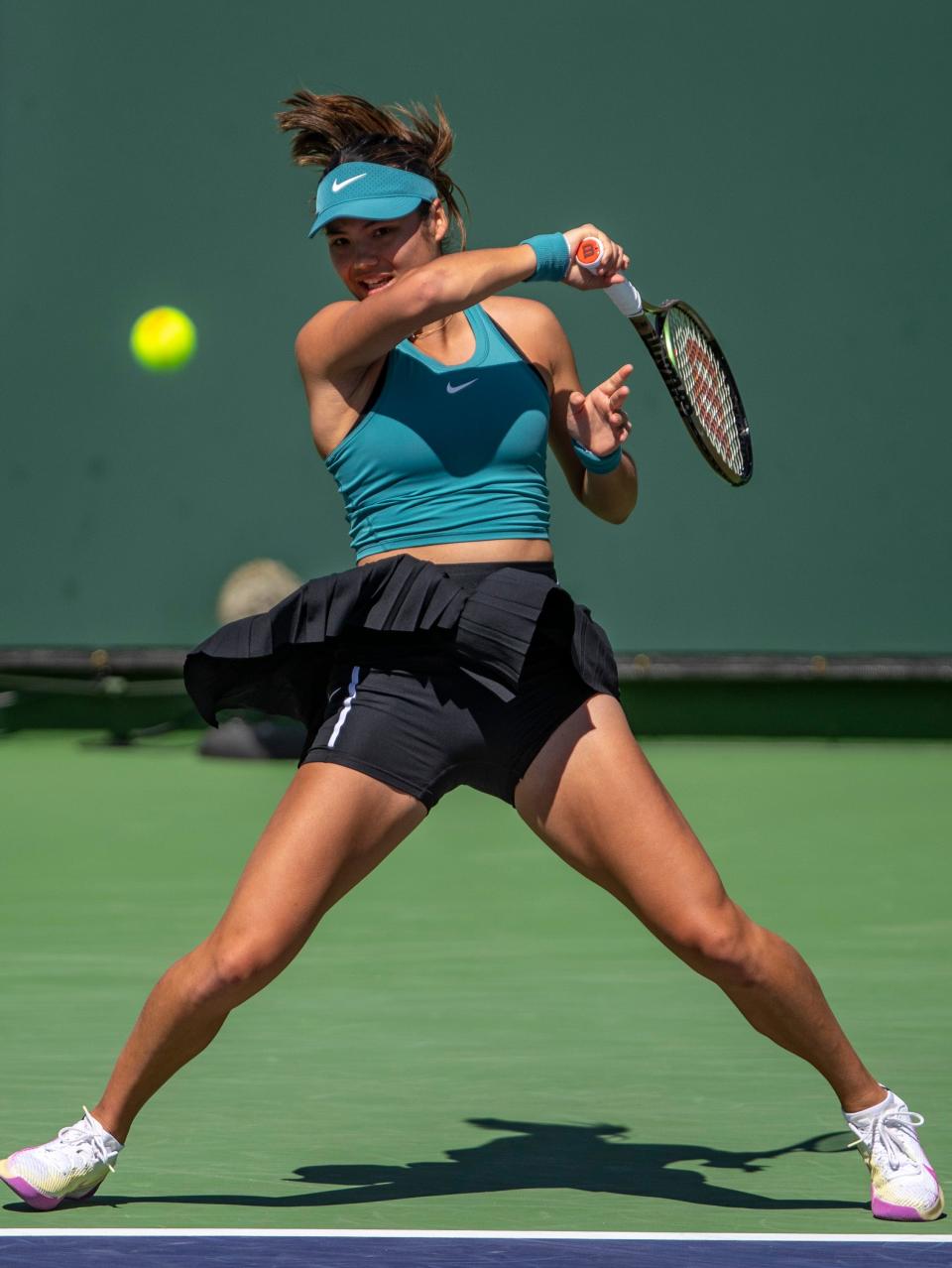 Emma Raducanu of Great Britain hits to Beatriz Haddad Maia of Brazil during their third-round match at the BNP Paribas Open at the Indian Wells Tennis Garden in Indian Wells, Calif., Monday, March 13, 2023. 