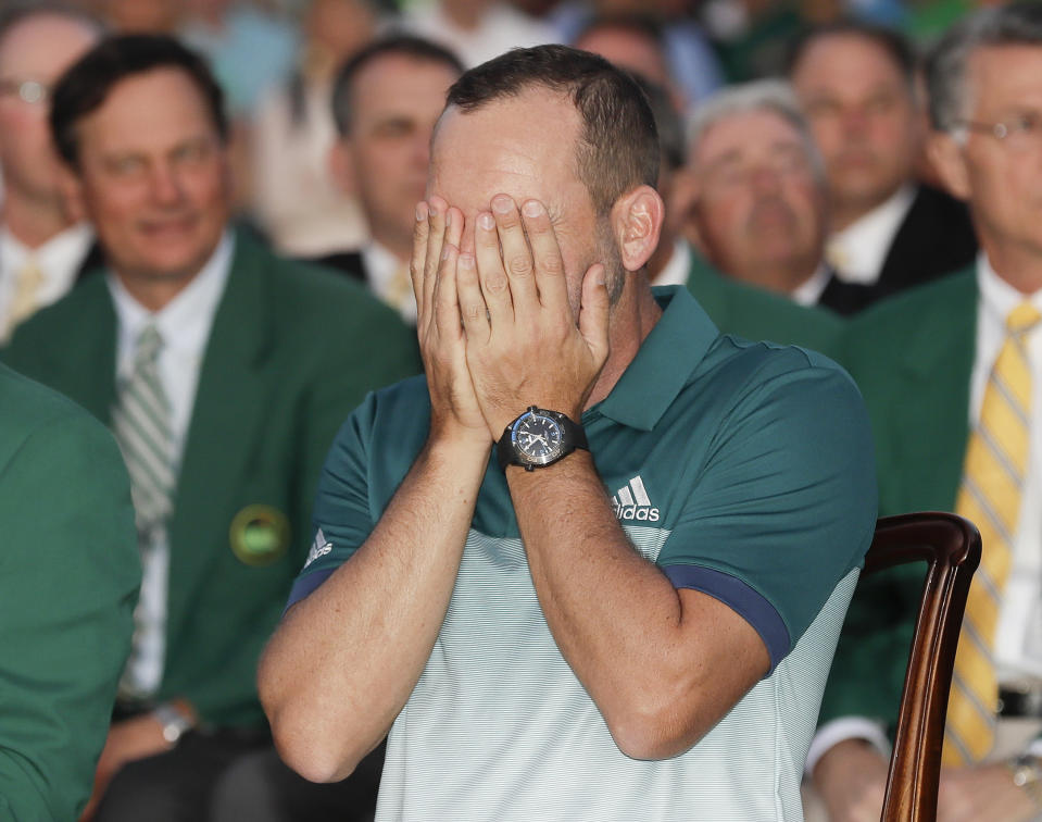 Sergio Garcia, of Spain, reacts at the green jacket ceremony after the Masters golf tournament Sunday, April 9, 2017, in Augusta, Ga. (AP Photo/David J. Phillip)