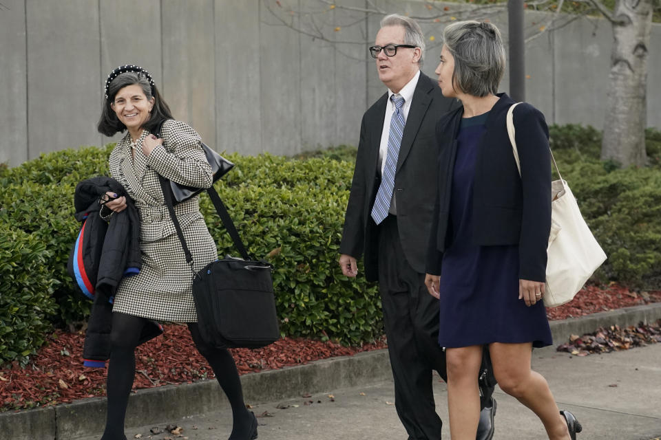 Attorneys Stacy Ferraro, left, Jim Craig, center, and Emily Washington leave a federal courthouse in Jackson, Miss., on Monday, Nov. 28, 2022, after a judge heard arguments about Mississippi's three-drug protocol for executions. Ferraro represents Thomas Edwin Loden Jr., who is scheduled for execution on Dec. 14. Craig and Washington are with the Roderick & Solange MacArthur Justice Center, which filed the 2015 lawsuit that challenges Mississippi's execution protocol. (AP Photo/Rogelio V. Solis)