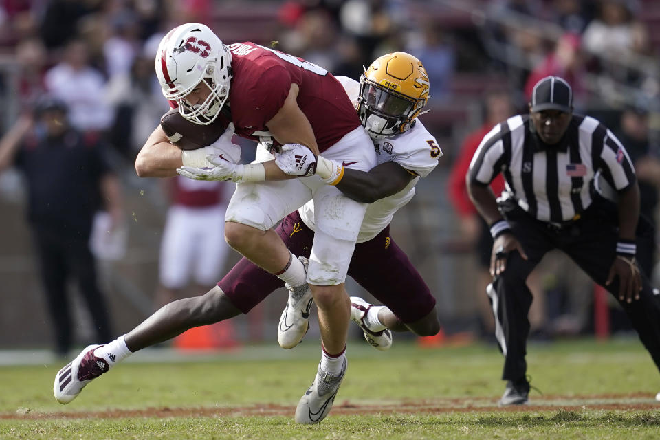 Stanford tight end Benjamin Yurosek, left, catches a pass in front of Arizona State defensive back Chris Edmonds during the second half of an NCAA college football game in Stanford, Calif., Saturday, Oct. 22, 2022. (AP Photo/Jeff Chiu)