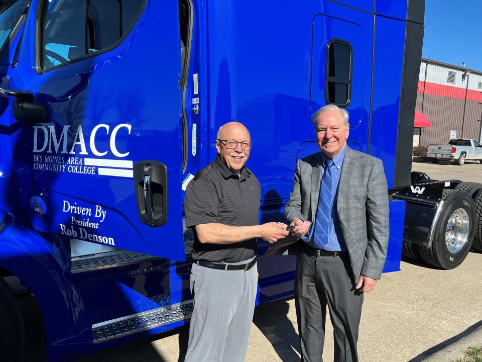 Rob Denson, president of Des Moines Area Community College, gets the keys to one of his annual loaner semis.