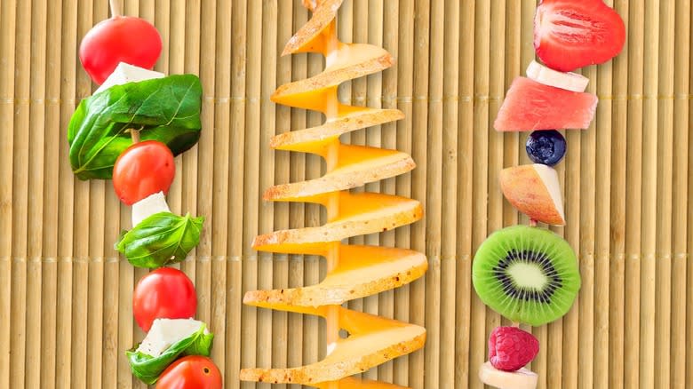 various skewers fruit and potatoes