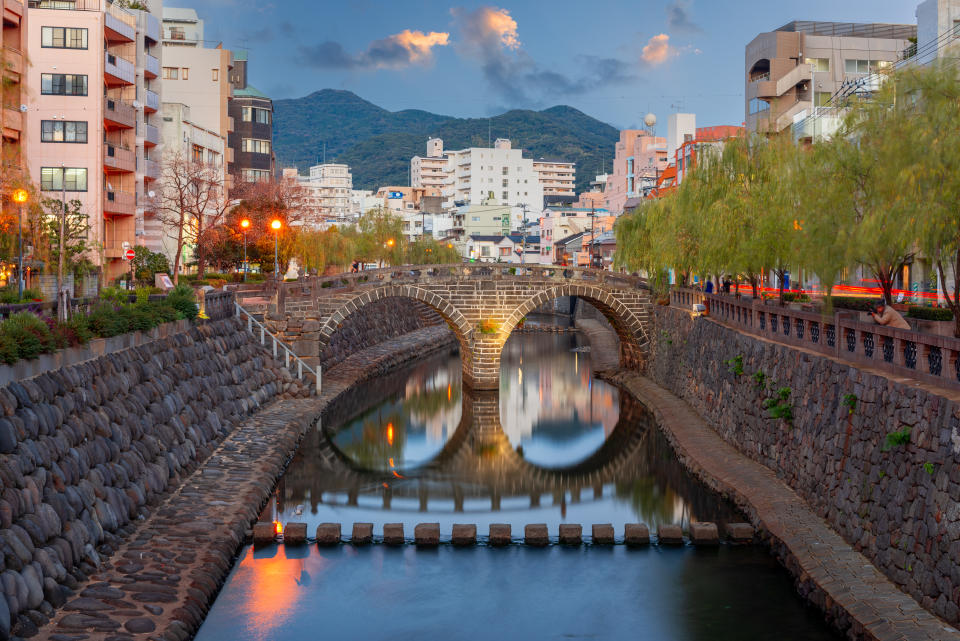 Spectacles Bridge in Nagasaki, Japan at dusk.