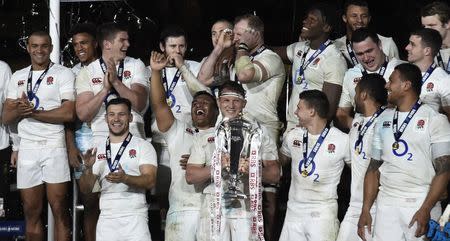 Rugby Union - Ireland v England - Six Nations Championship - Aviva Stadium, Dublin, Republic of Ireland - 18/3/17 England's Dylan Hartley celebrates with the Six Nations trophy after the game Reuters / Clodagh Kilcoyne Livepic