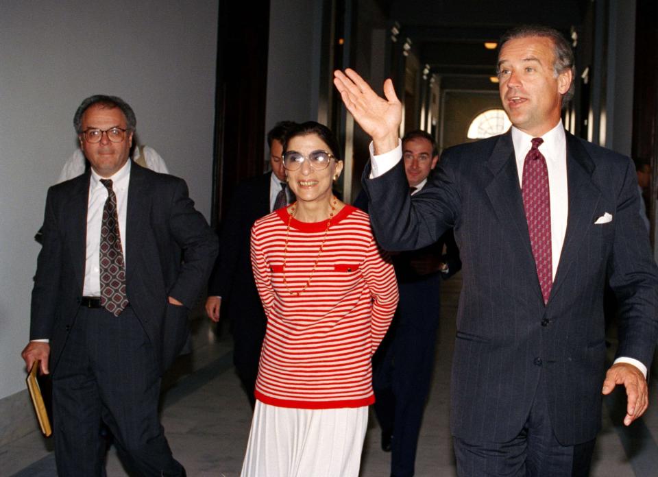 Sen. Joe Biden (D-Del.), chariman of the Senate Judiciary Committee, escorts Judge Ruth Bader Ginsburg, Pres. Clinton's choice for Supreme Court vacancy, on Capitol Hill, June 15, 1993.