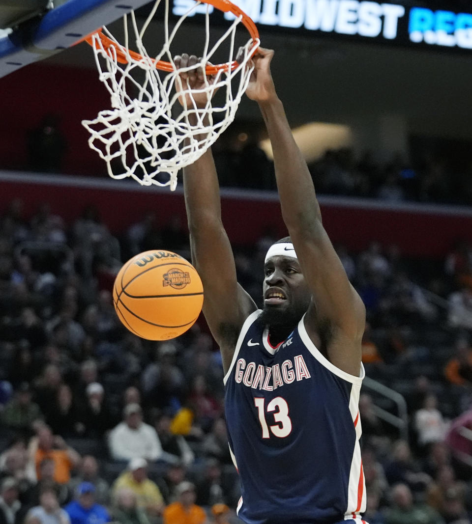 Gonzaga forward Graham Ike dunks during the first half of a Sweet 16 college basketball game against Purdue in the NCAA Tournament, Friday, March 29, 2024, in Detroit. (AP Photo/Paul Sancya)