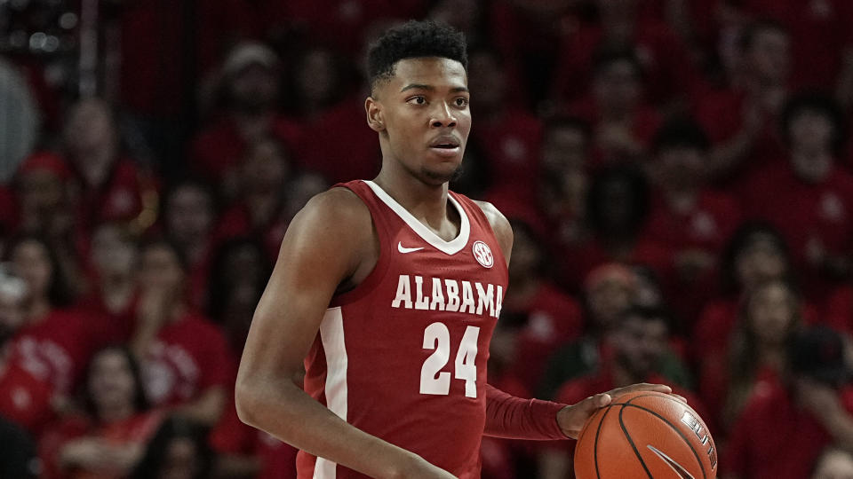 Alabama forward Brandon Miller advances the ball during the first half against Houston on Dec. 10, 2022, in Houston. (AP Photo/Kevin M. Cox)