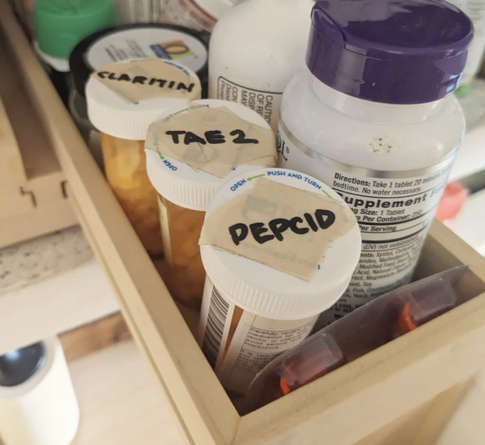 labeled tape on pill bottles