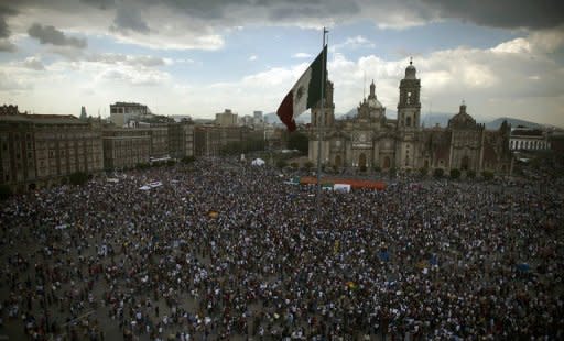 Tens of thousands of demonstrators marched through Mexico City against the presidential election win of Enrique Pena Nieto, accusing him and his party of widespread vote-buying