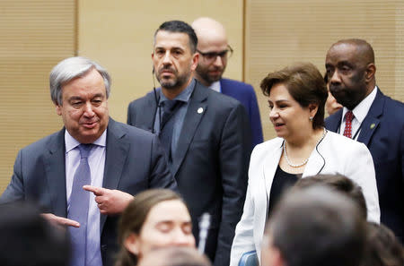 U.N. Secretary General Antonio Guterres and executive secretary of the U.N. Framework Convention on Climate Change Patricia Espinosa arrive for a meeting with representatives of various NGO organisations before the final session of the COP24 U.N. Climate Change Conference 2018 in Katowice, Poland, December 14, 2018. REUTERS/Kacper Pempel