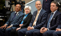 Federal Reserve Board Chairperson Janet Yellen (2nd, L) joins (L-R) African Union Commissioner for Economic Affairs Anthony Mothae Maruping, Argentina's Central Bank Chairman Federico Sturzenegger and Argentina's Treasury Minister Nicolas Dujovne, posing with ministers and bank governors for a family photo during the IMF and World Bank's 2017 Annual Spring Meetings, in Washington, U.S., April 21, 2017. REUTERS/Mike Theiler