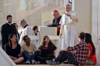 Pope Francis blesses youths ahead of a prayer vigil on the occasion of the World Youth Days, in Campus Misericordiae in Brzegi, near Krakow, Poland, Saturday, July 30, 2016. (AP Photo/Gregorio Borgia)