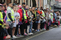 <p>Spectators wait for procession to pass on the first day of the Notting Hill Carnival in west London on August 28, 2016. (Photo: DANIEL LEAL-OLIVAS/AFP/Getty Images) </p>