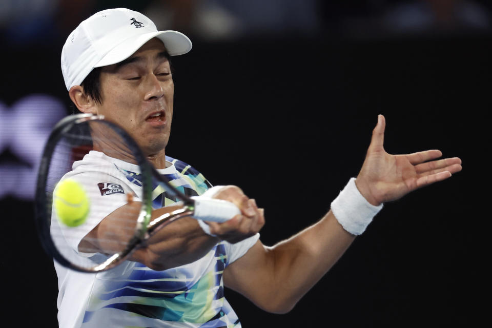 Mackenzie McDonald of the U.S., plays a forehand return to Rafael Nadal of Spain during their second round match at the Australian Open tennis championship in Melbourne, Australia, Wednesday, Jan. 18, 2023. (AP Photo/Asanka Brendon Ratnayake)