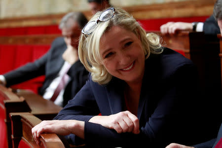 FILE PHOTO: French far-right National Rally (Rassemblement National) party leader Marine Le Pen at a session of the National Assembly in Paris, November 27, 2018. REUTERS/Gonzalo Fuentes/File Photo