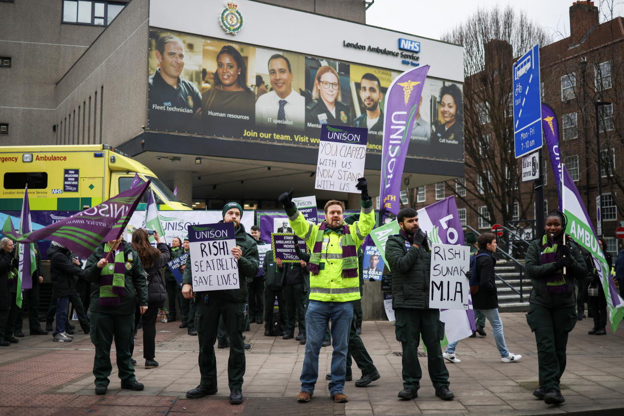 People protest in front of the London Ambulance Service during a strike by ambulance workers due to a dispute with the government over pay, in London, Britain January 23, 2023. REUTERS/Henry Nicholls