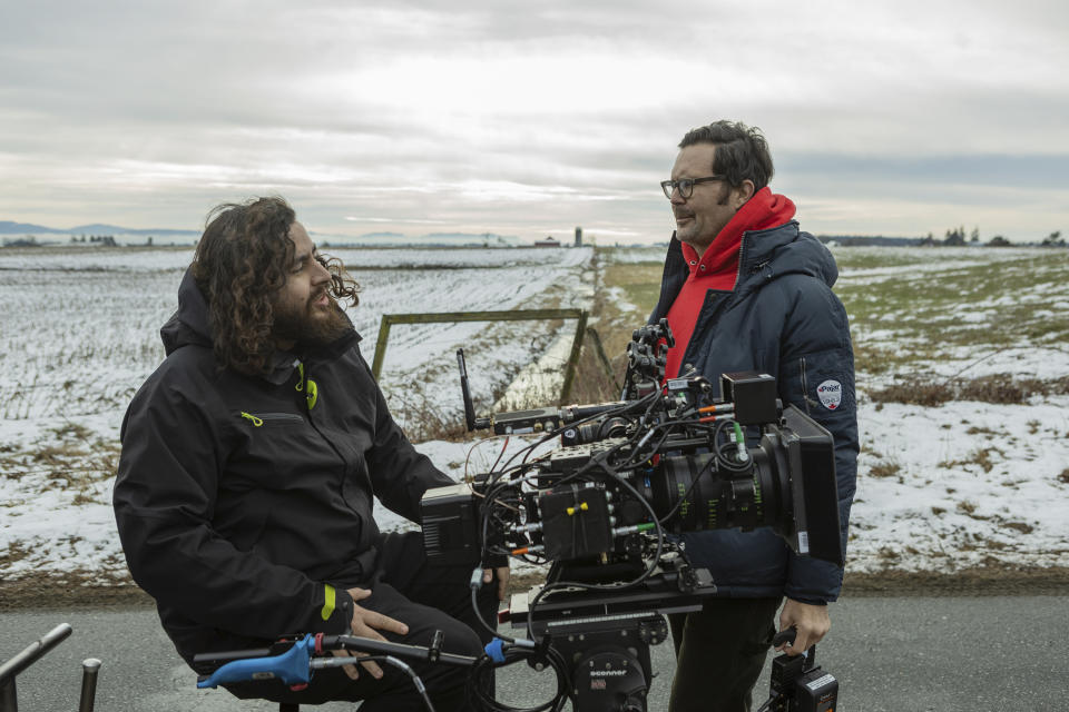 This image released by Neon shows Andres Arochi, left, and Osgood Perkins on the set of "Longlegs." (Neon via AP)