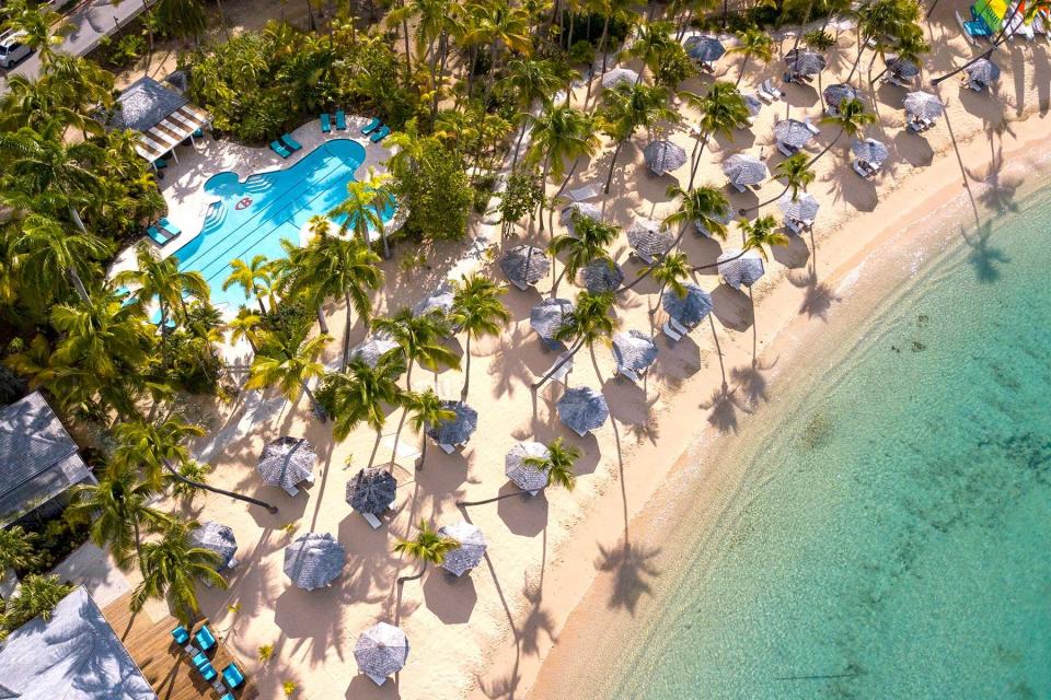 Beach and swimming pool at Curtain Bluff