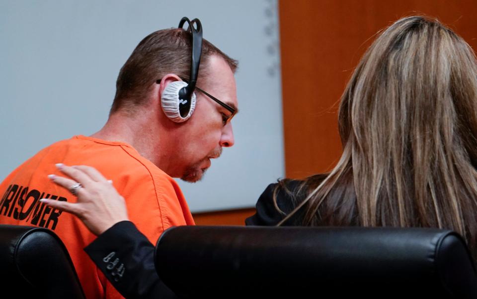 James Crumbley, left, sits with his attorney Muriel Lehman during a hearing in the Oakland County Courtroom of Cheryl Matthews on Wednesday, Feb. 21, 2024. Crumbley is being tried on four counts of involuntary manslaughter after his son was the perpetrator in a mass shooting at Oxford High School killing four students. His wife Jennifer Crumbley was found guilty on all four counts in this landmark case holding parents responsible for the guns that are in their homes.