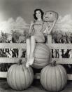 <p>Rutherford perched on a pile of perfect pumpkins in this fun 1940 shot.</p>