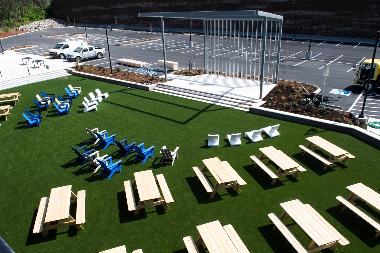 The rooftop bar at Kern's Food Hall includes a view of the event lawn, which will host live entertainment and the biggest televised sports games on a large screen. Seating is available for adults to enjoy alcohol or for kids to enjoy a sweet treat from Irvey's Ice Cream, a vendor whose stall is set up just inside the food hall near the lawn.