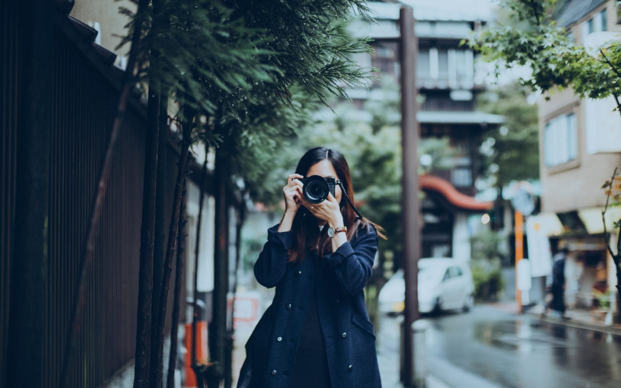 Japanese travellers invariably bring very hi-tech photography equipment - Getty