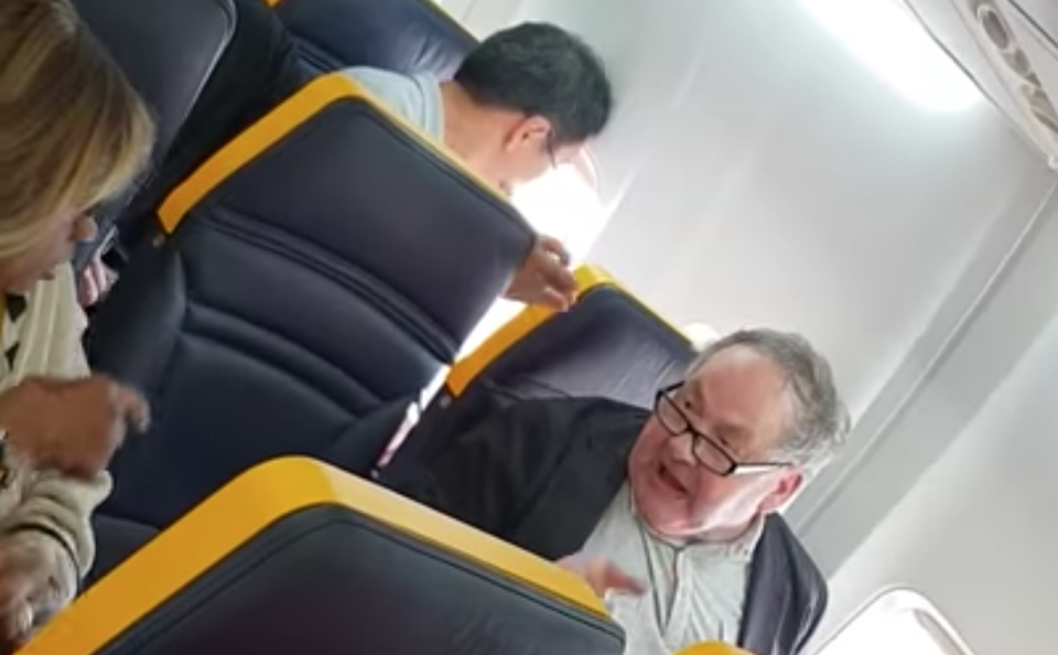 Footage recorded on a Ryanair flight on Oct. 19 showed a white man berating a black woman. (Photo: YouTube)